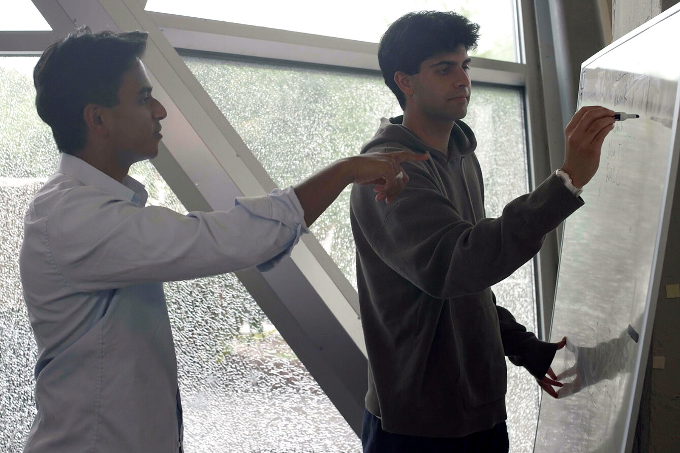 PIP winners using a white board